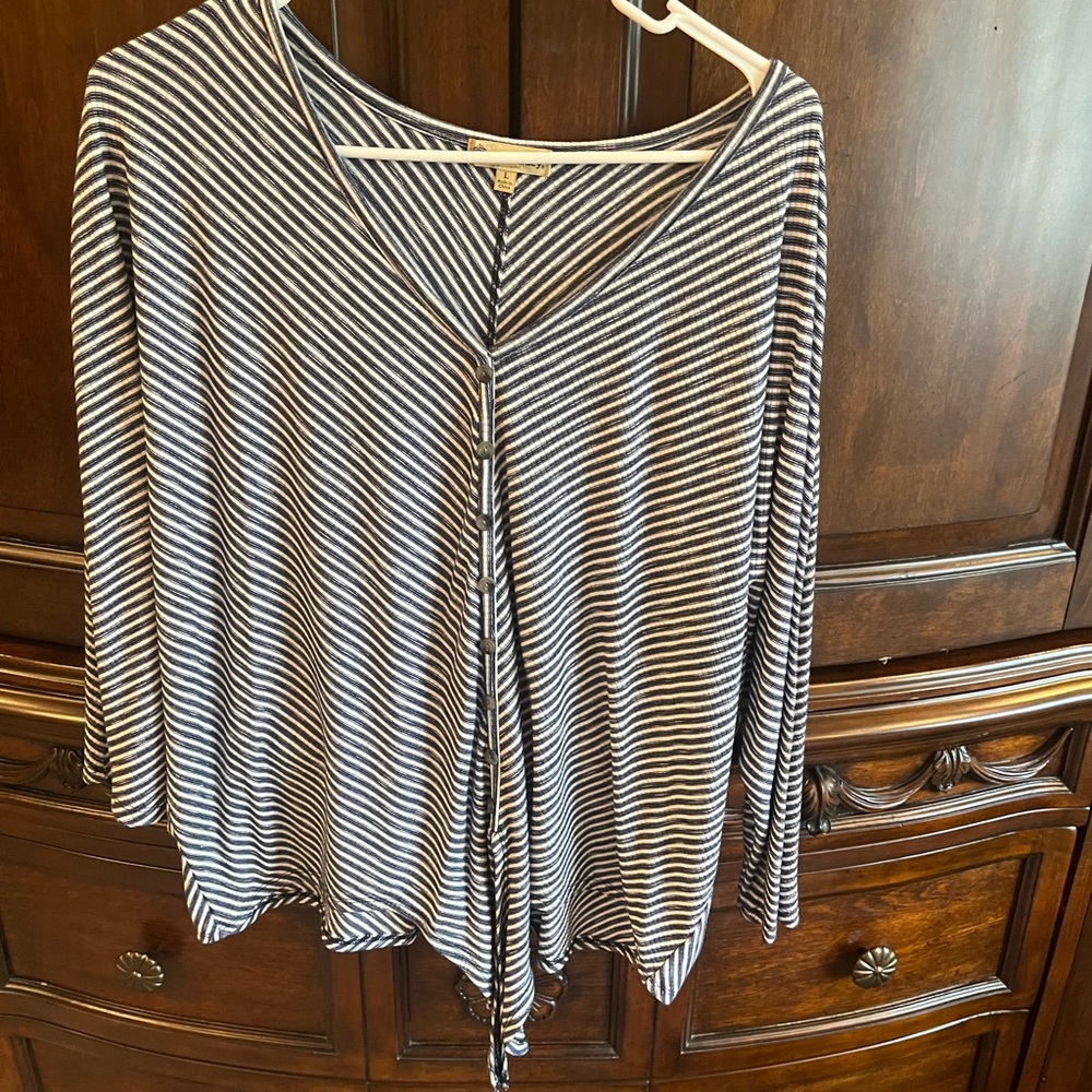 Ladies top with tie front at waist. Denim blue and white stripe